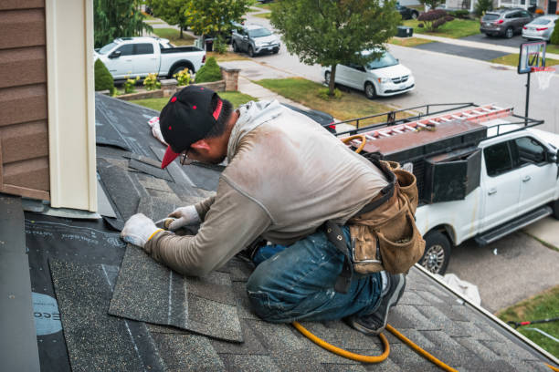 Professional Roofing technician working in Holliston, MA
